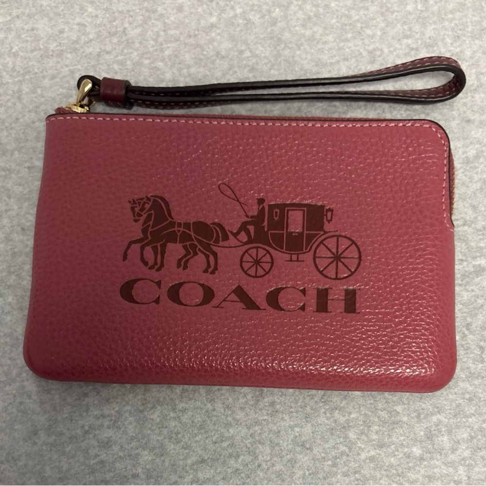 Coach embossed Pink mauve Wristlet EUC
